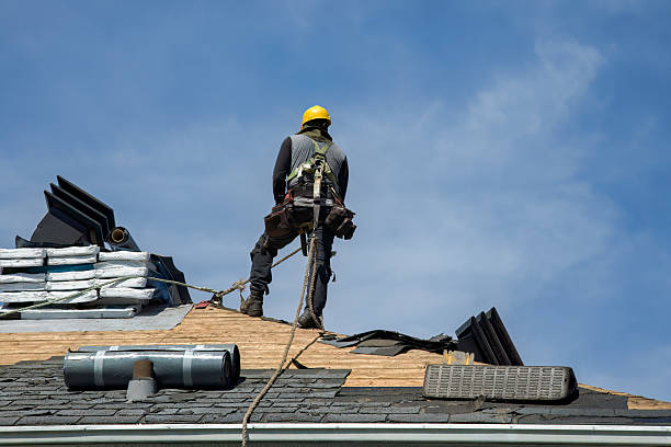 Professional Roofing technician working in Southport, IN